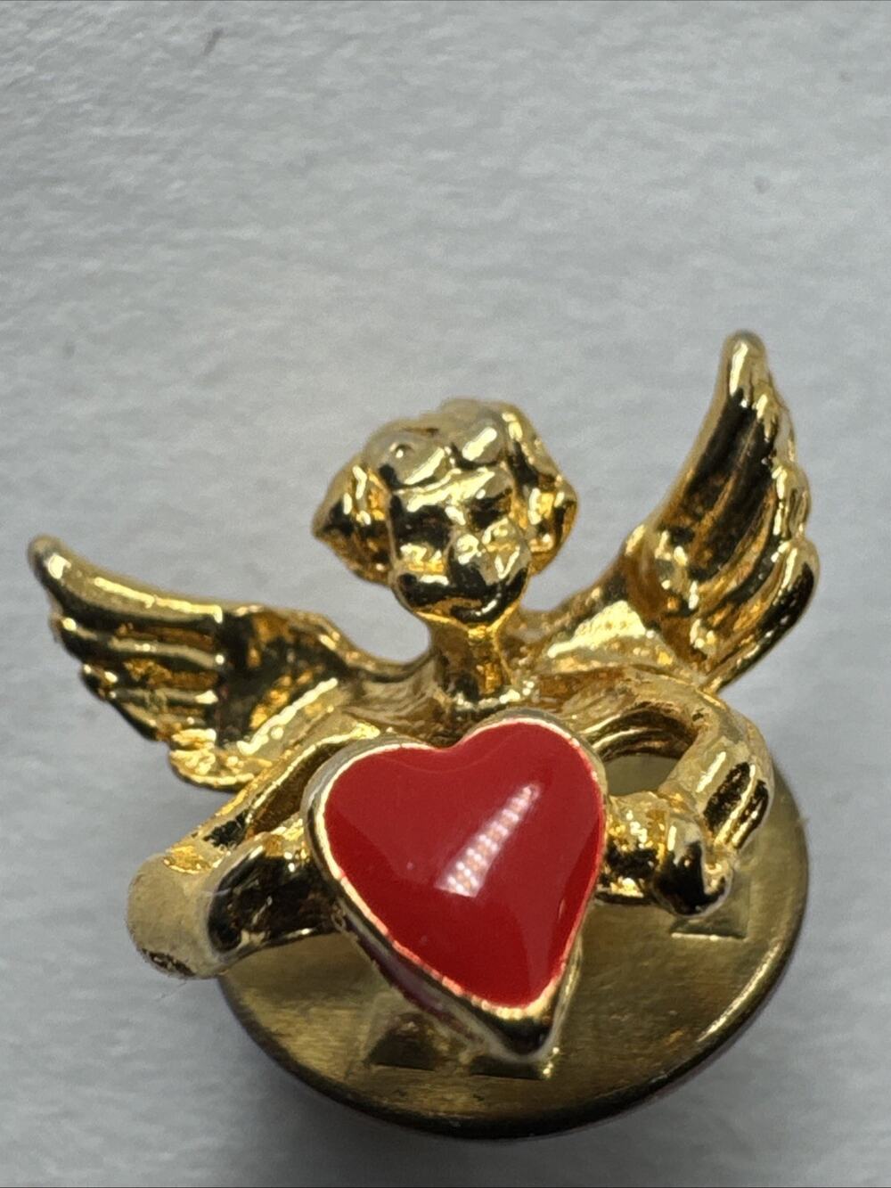 SMALL ANGEL HOLDING HEART LAPEL PIN